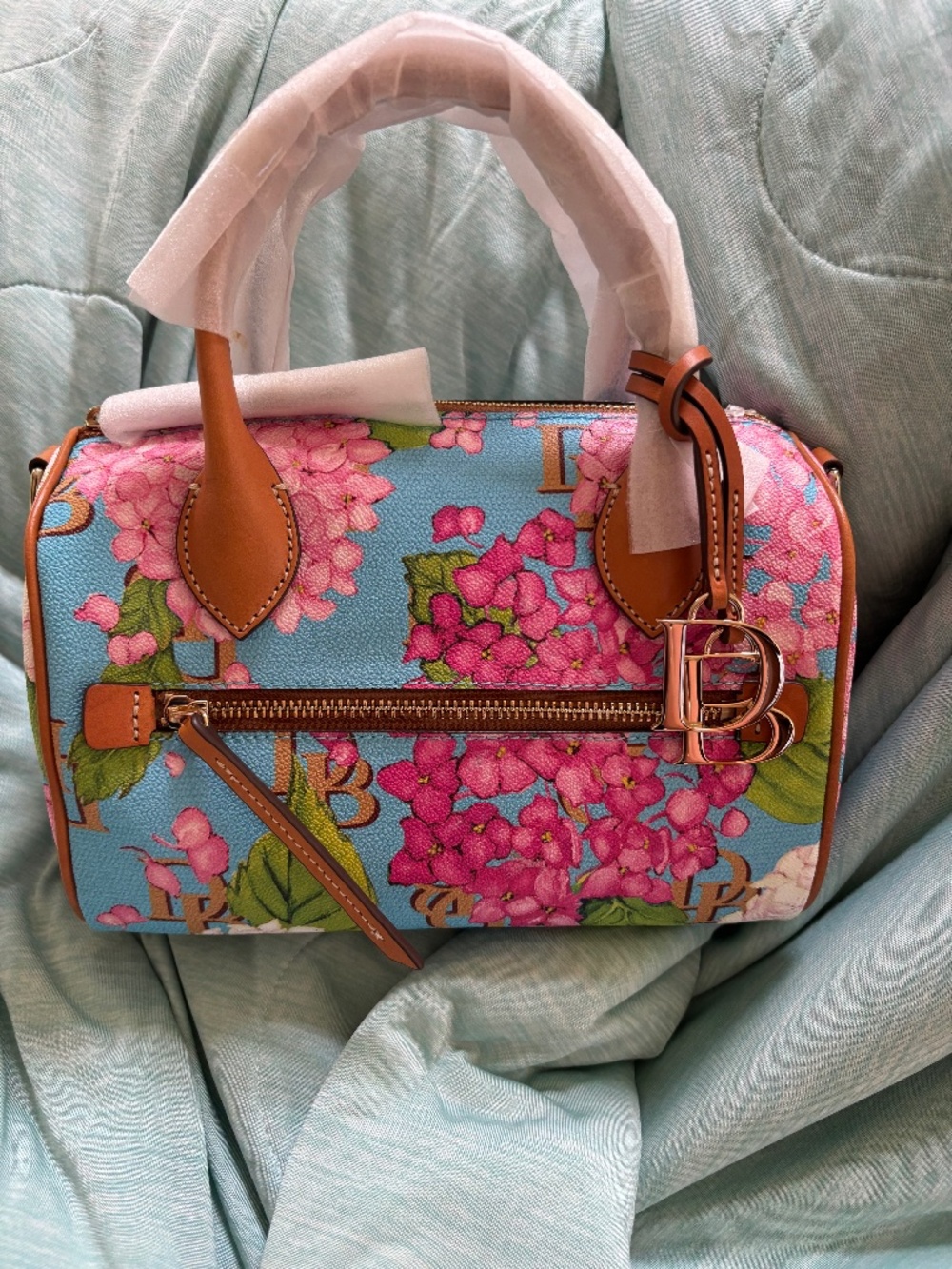 Brand new Dooney & Bourke blue hydrangea barrel satchel